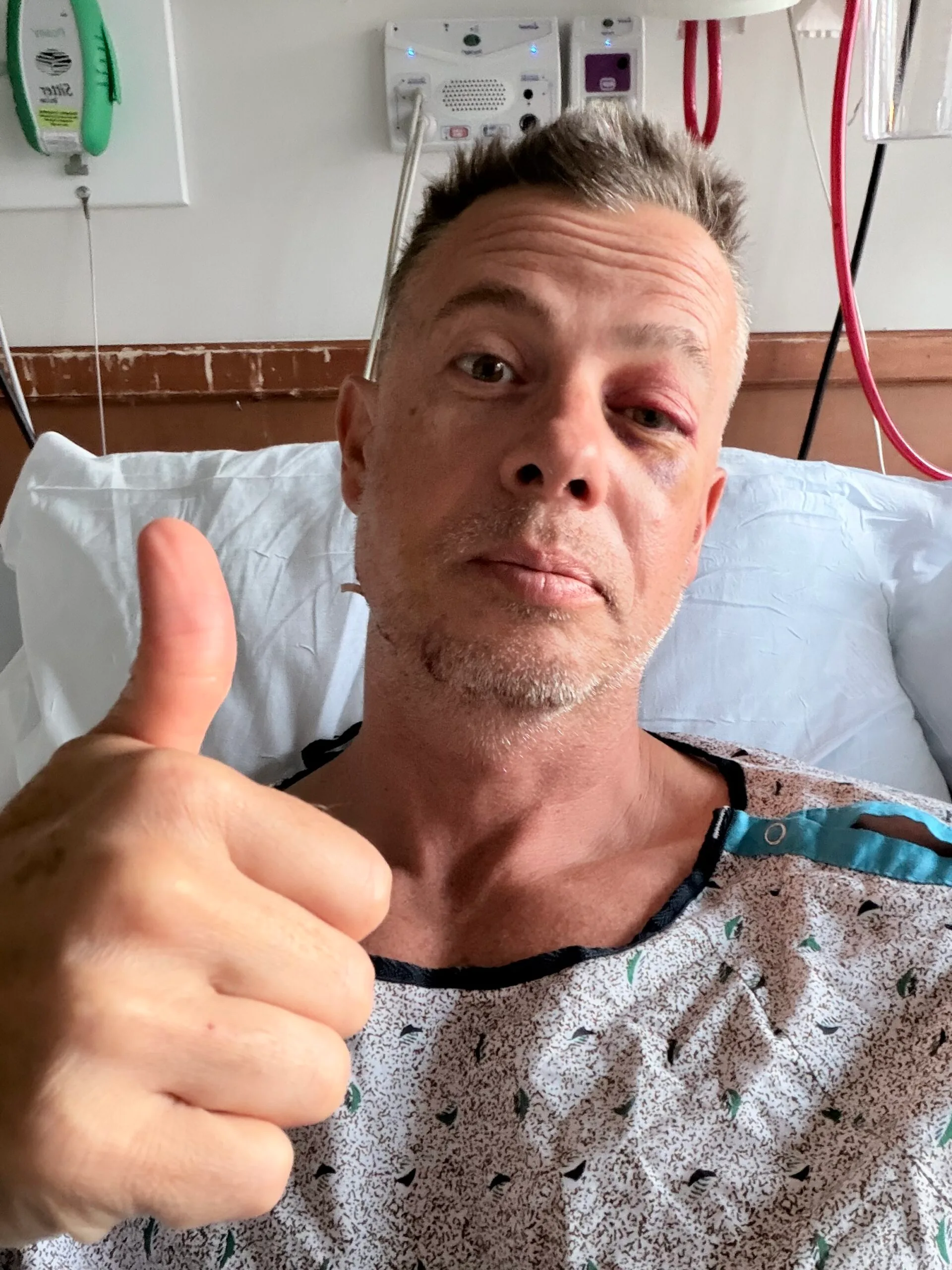 Image of man recovering in hospital