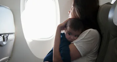 Mum kicked off flight for breastfeeding her son