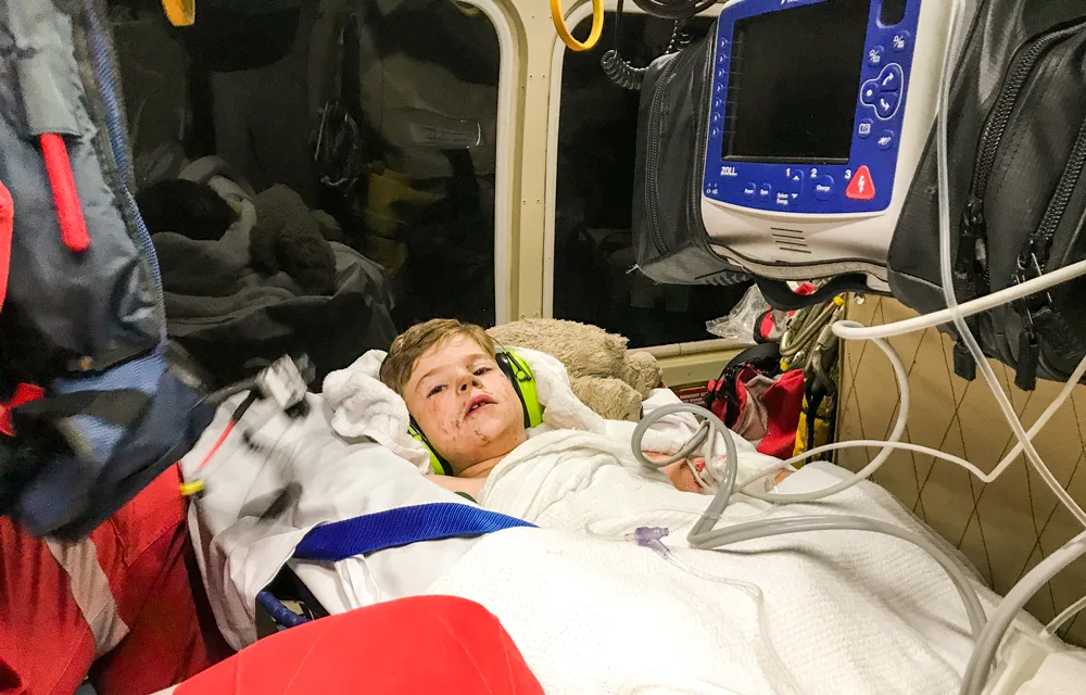 Being airlifted to hospital