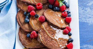 Chocolate pancakes with caramel syrup