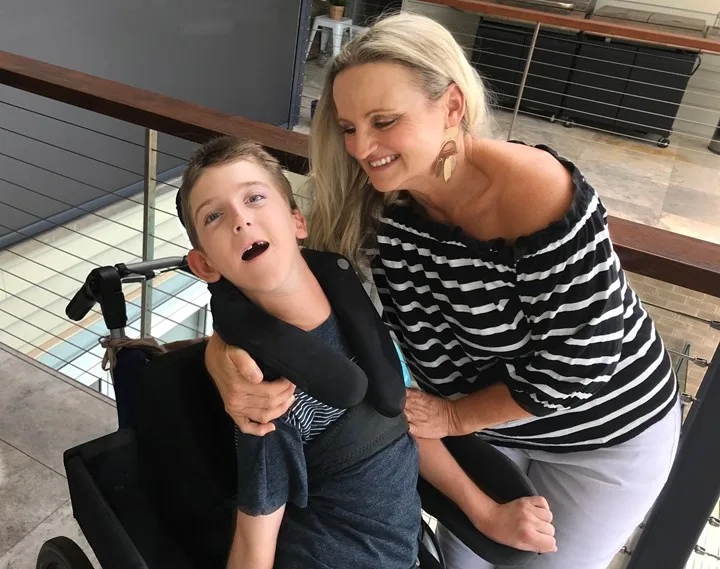 Michelle, whose son Jacko has cerebral palsy, began bargain-hunting after quitting her job as a teacher to look after her little boy (pictured together) full-time