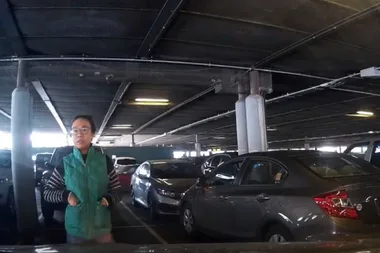 Angry standoff over woman’s cheeky tactic to reserve parking space