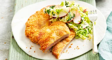 Crumbed pork schnitzel with apple slaw