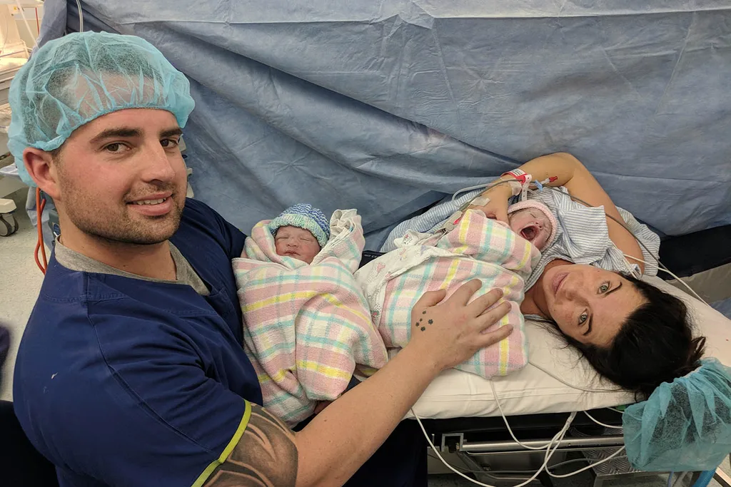 Chris and me welcoming our twins