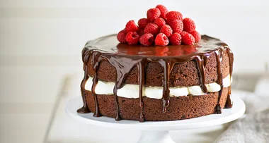 Chocolate cake with raspberries and cream