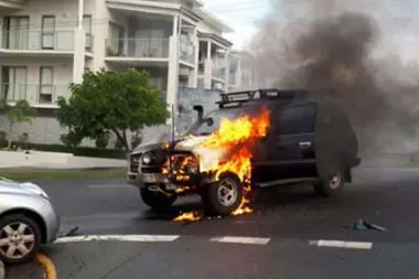 Horrifying moment a 4WD crashes into another car then bursts into FLAMES