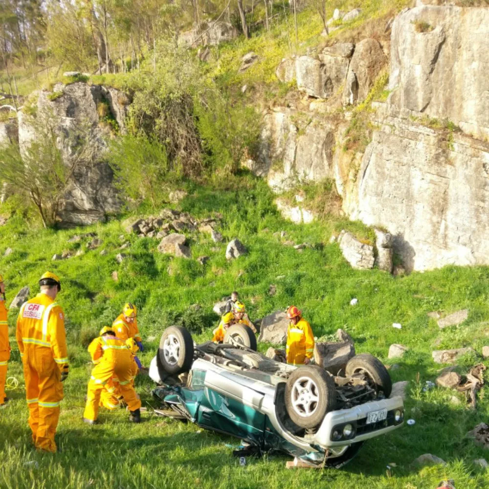 Rescue workers and Shannon Bennett's car