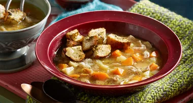 Chicken and vegetable soup with pesto croutons