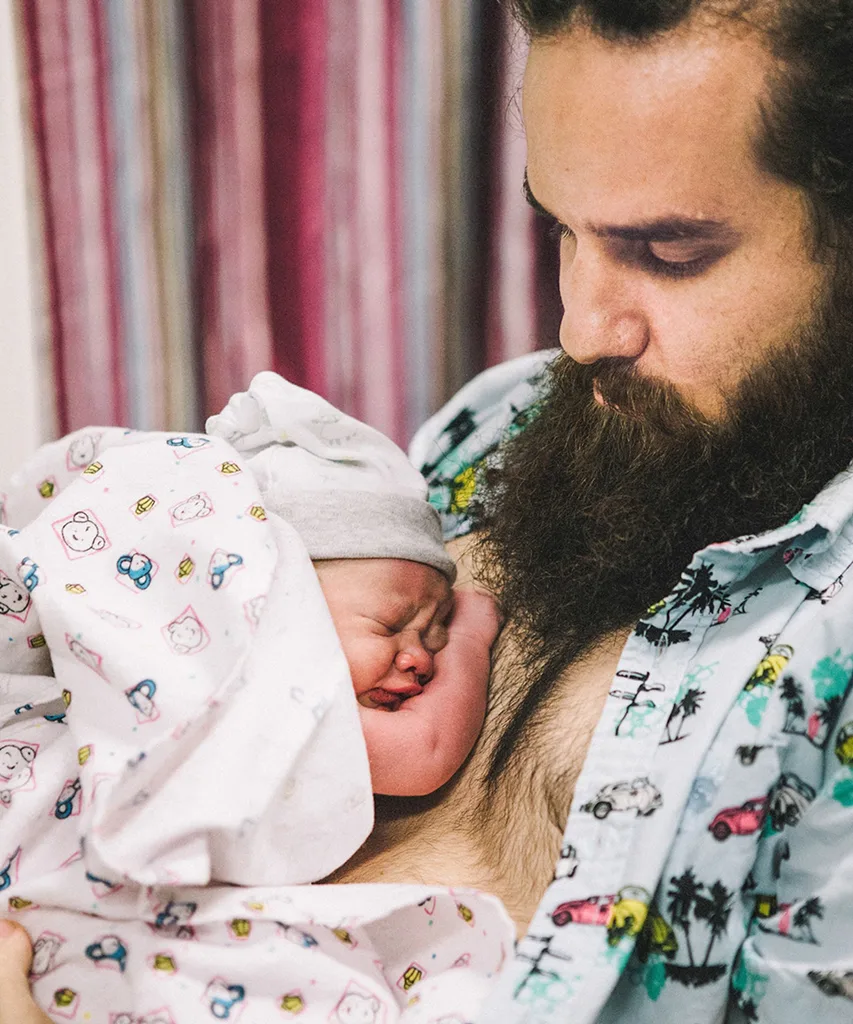 Gareth holding Rixon for the first time