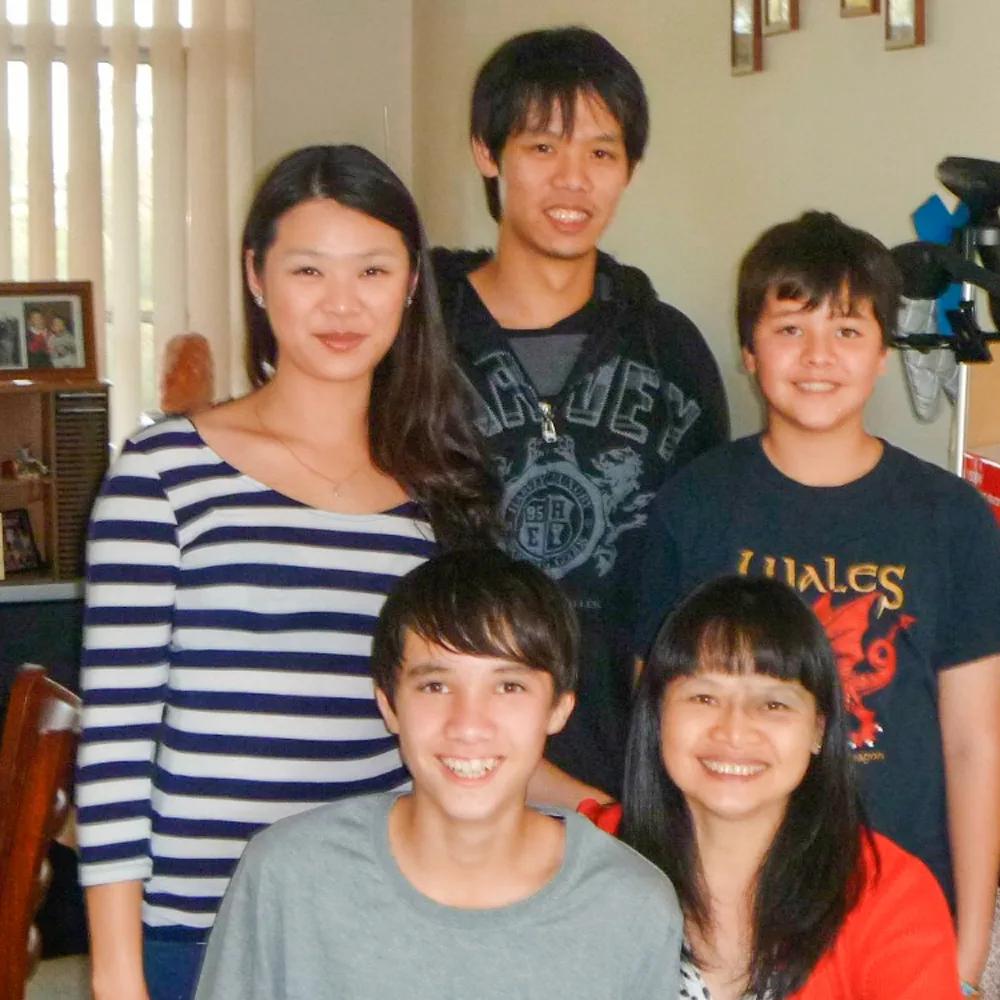 Me, my brothers Pat and Andrew, James at the front with our mum Nongnuch