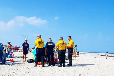 Woman IMPALED by beach umbrella while sunbaking