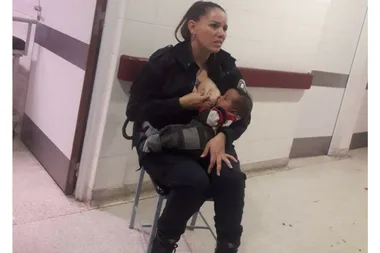 Police officer breastfeeds malnourished baby in incredible act of generosity