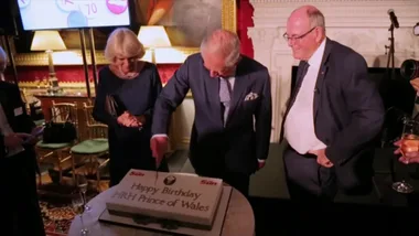 WATCH: Moment Camilla helps baffled Charles cut birthday cake