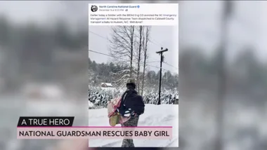 A National Hero! Guardsman Carries Stranded Baby Through the Snow to Safety