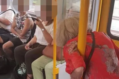Picture of elderly lady standing on train outrages the internet – but there is a twist