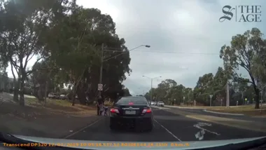 WATCH: Two young kids run onto busy road after escaping daycare in shocking footage