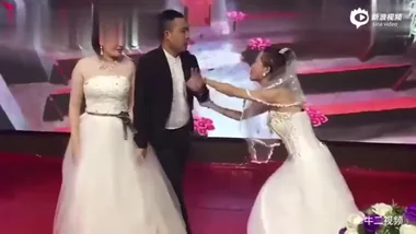 WATCH: Woman crashes wedding of ex-boyfriend wearing a WEDDING dress