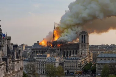 Notre Dame Cathedral ‘colossally damaged’ as fire tears through the 856-year-old church