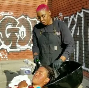 Armed with a hairbrush, mum-of-six Shirley Raines took to the streets to help others.