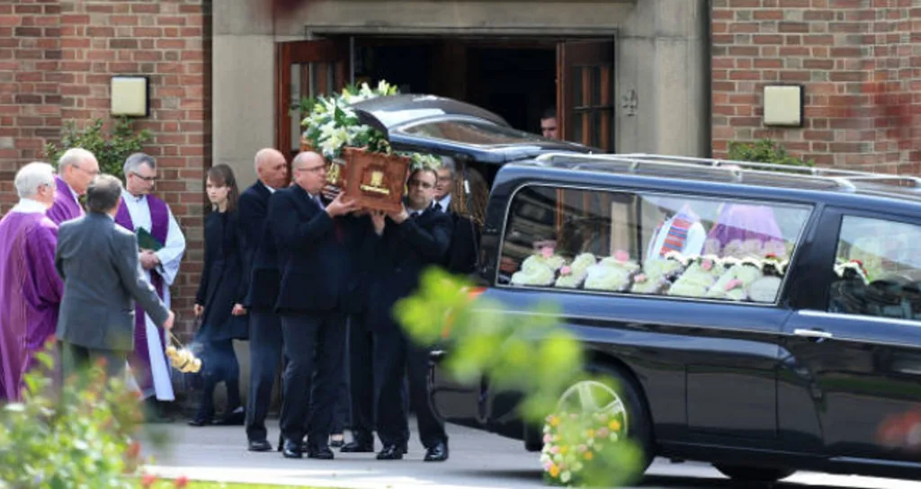 Mourners attend Ann Maguire's funeral