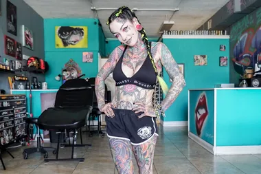 Modified mum tattoos her eyeballs pink