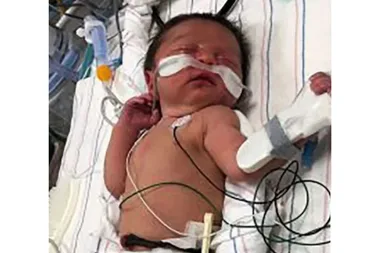 Crying newborn baby is discovered naked in woods