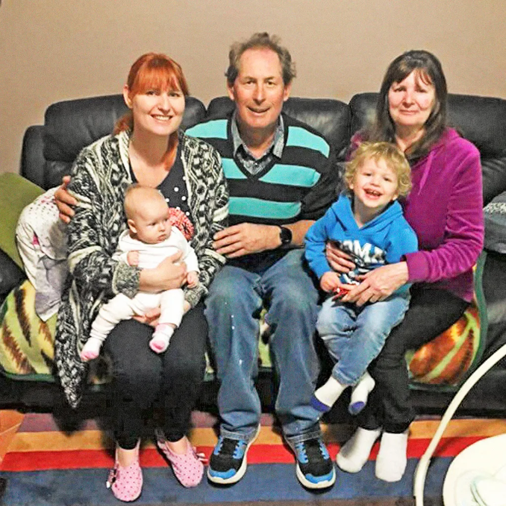 Vicki holding Phoenix, Norm, and Vicki's mum Maree with Mitchell