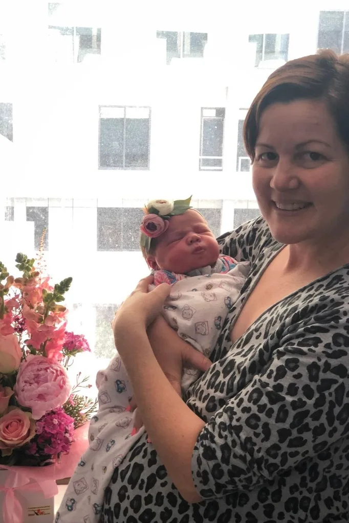 Stacey Hughes with her newborn daughter Andi who was born after gender selection IVF