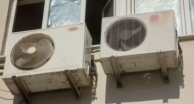Toddler crushed to death by air con unit