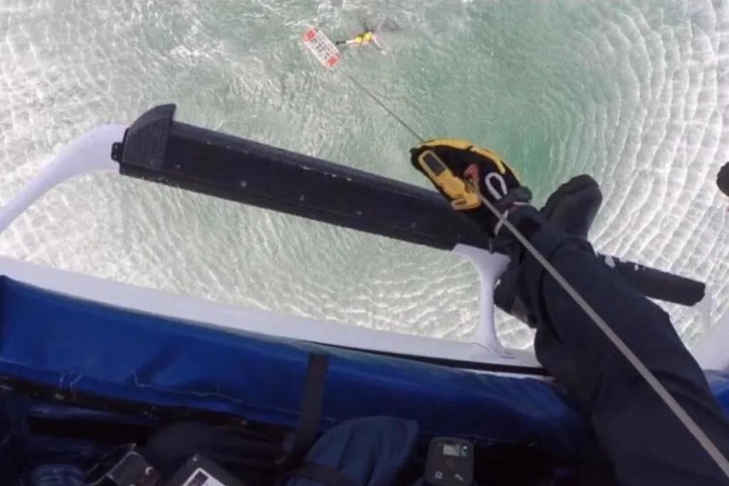 Sweet Julian being winched into the helicopter.
