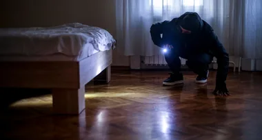 Man wakes up in bed to find burglar SUCKING HIS TOES