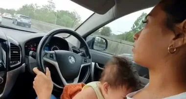 Mum shares ‘dangerous’ video of herself breastfeeding while driving a car