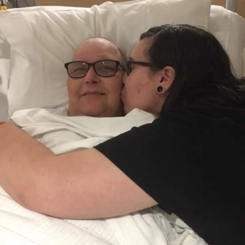 Rita in hospital with her daughter Laura.