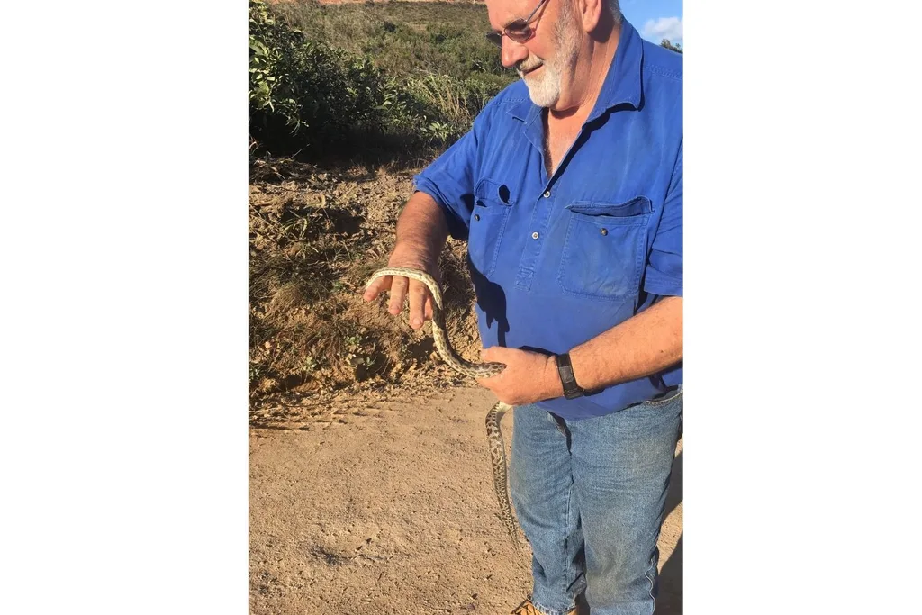 Tony with a snake