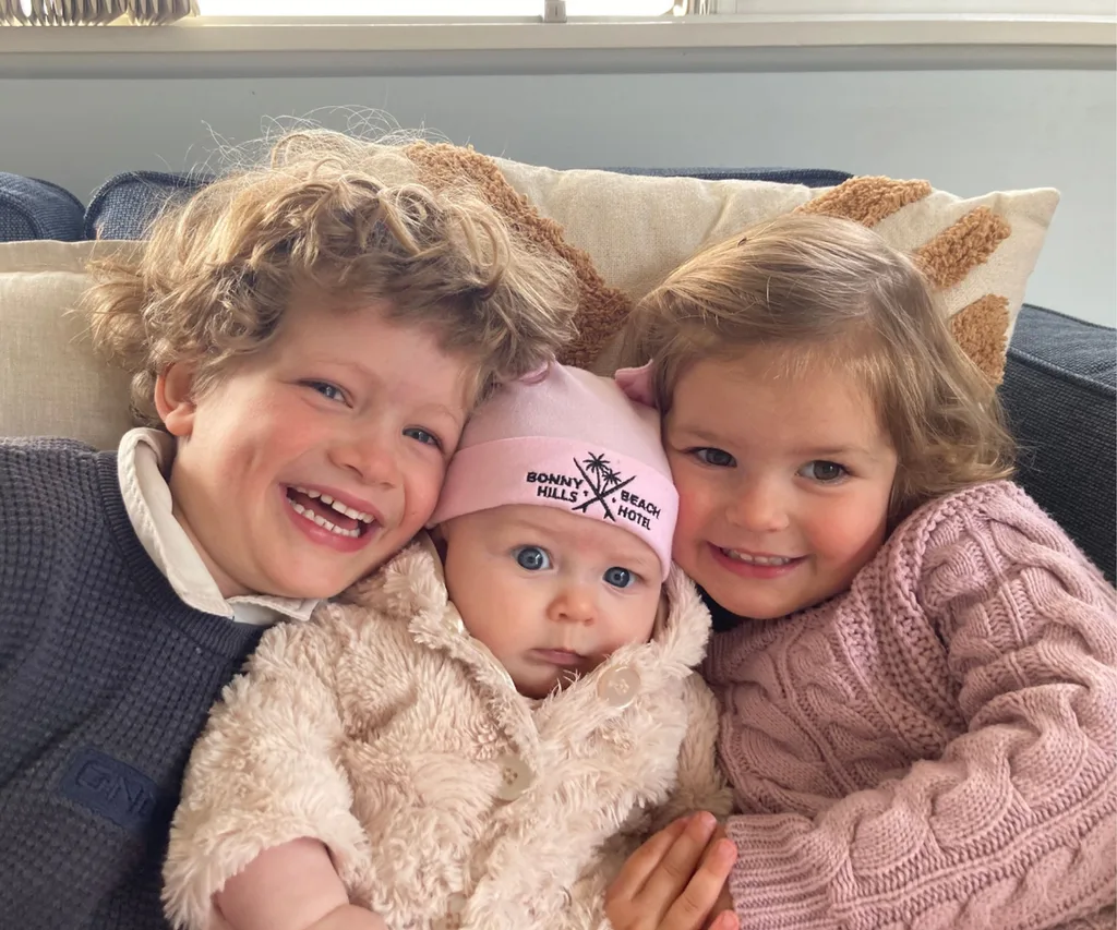 Theodore and Gigi with their baby sister