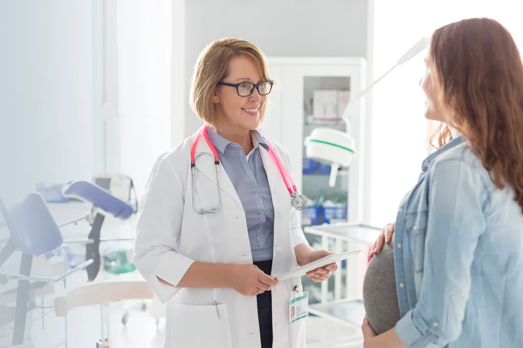 Doctor discusses options with pregnant woman