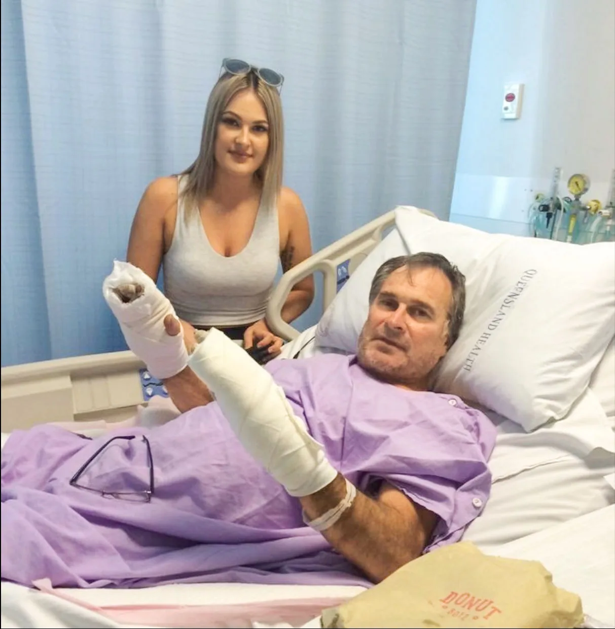 Philip in hospital with his daughter, Greta