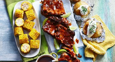 Slow cooked BBQ ribs with corn