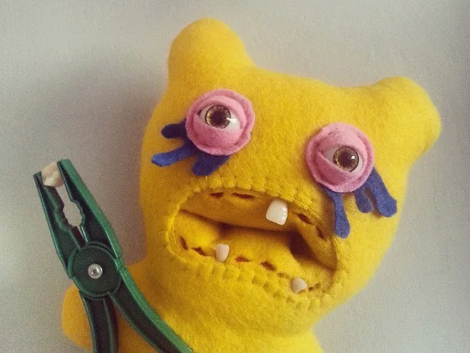 Yellow fuggler with pliers.