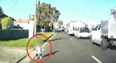 Toddler saved from busy road by quick-thinking motorist