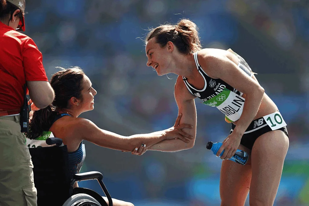 D'Agostino in a wheelchair after the race thanking Hamblin