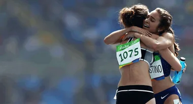 The Olympic Spirit shines through when these runners crash out of the race