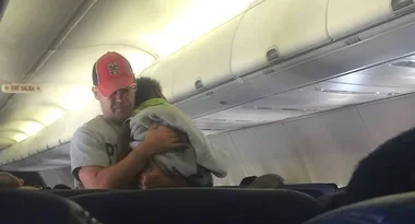 When this pregnant mum needed a rest on a flight an unlikely hero stepped in