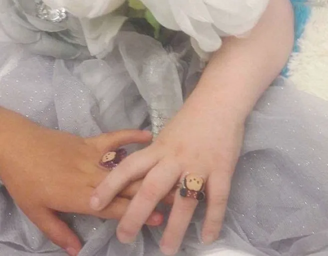 They had matching Mickey Mouse rings