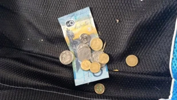 robber left over $20 in the driver seat