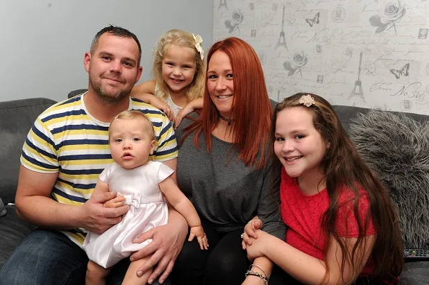 Frankie with her parents and sisters