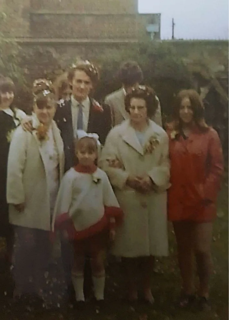 Gill and Carson with Helen (far right) on their wedding day