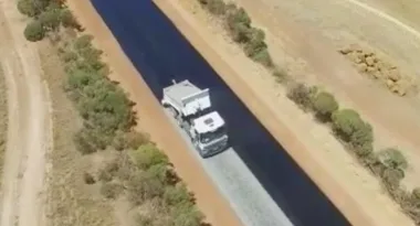 Awe-inspiring video of an outback Aussie road being born will mesmerise you