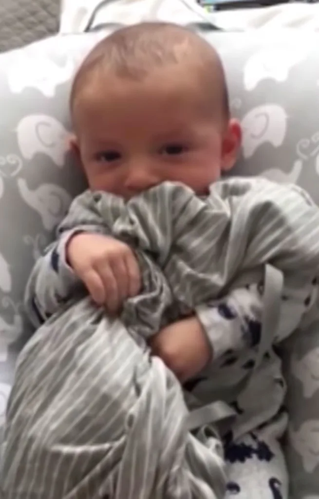baby calms own with mum