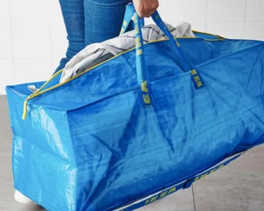 Fashion designer copies famous blue IKEA bag